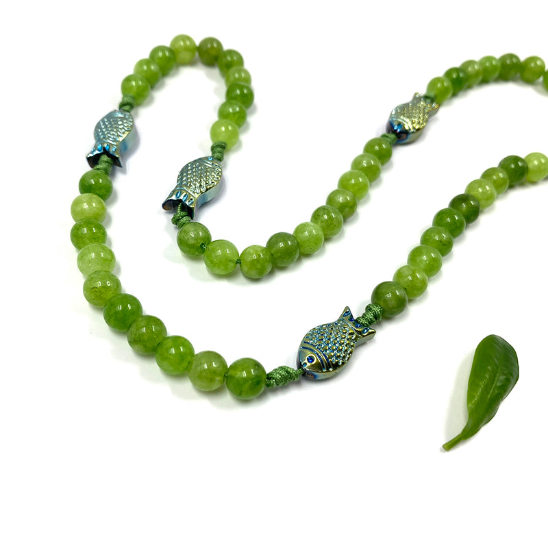 Design Rosenkranz Unikat individuell geknüpft handgeknüpft Edelstein Edelsteinrosenkranz Perlen Peridot grün Edelsteinkreuz Geschenk Bub Junge Mann Konfirmation Firmung Erstkommunion Kommunion Fisch Fischperlen Zwischenperlen 6 mm Autorosenkranz Rosenkranz Jugendweihe Katholisch christlich 