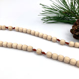 Zirbenholz Rosenkranz Zirbe Nonnen Goldenstein Klosterschwestern Salzburg drei schwestern Zirbe Zirbenholzperlen handgemachter Rosenkranz Österreich handgefertogt handgeknüpft Spende Rosenkranz kaufen Österreich